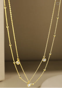 Gold double layered and ball chain necklace