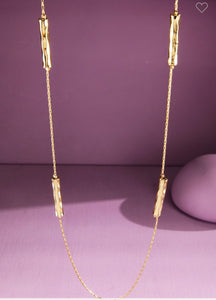 Gold cylinder bead necklace