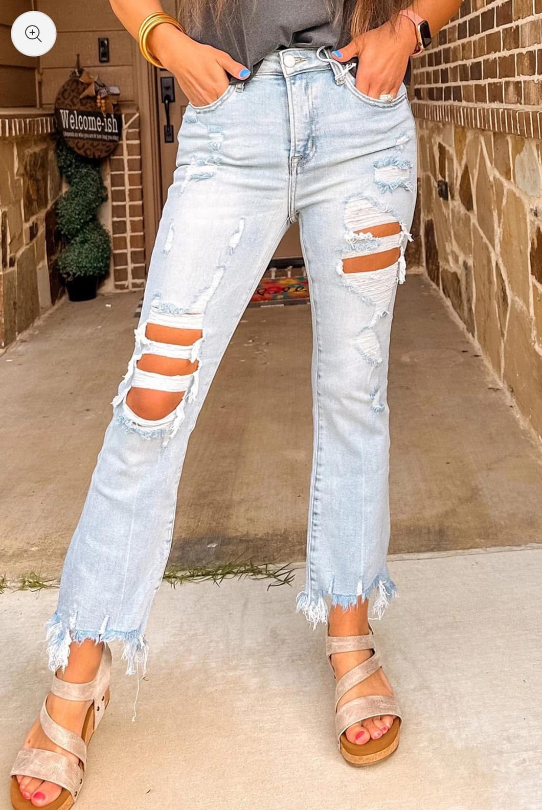 Light blue cropped high rise distressed jeans